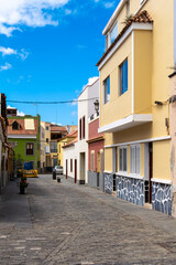Typical old town street in Santa Brigida, Gran Canaria with colorful houses, cobblestones and a calm Mediterranean atmosphere on a sunny day.