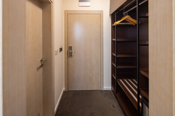 Hotel room entrance with wardrobe area