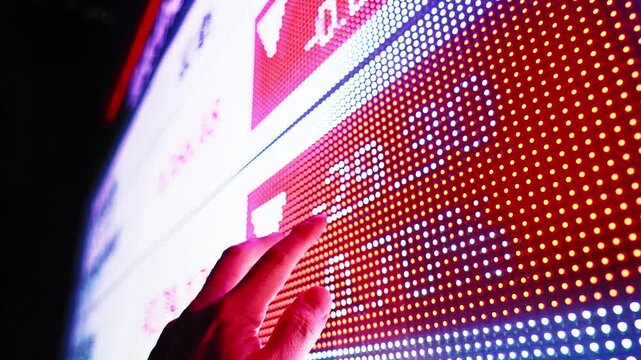 Man finger showing digital screen with graphs and charts stock market. Concept of investing money on shares, analyzing stock market and financial, slow motion