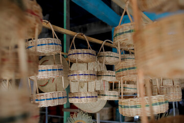 traditional market with goods made from rattan, bamboo and palm leaves.