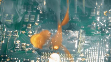 Catastrophic Electronic Failure and Electrical Fire. Close-up of a Short Circuit with Burning Microchip, Exploding Capacitor, and Sparks on a Motherboard / Printed Circuit Board (PCB). - Powered by Adobe