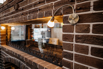 Close-up of faux brick wall with horizontal fireplace window