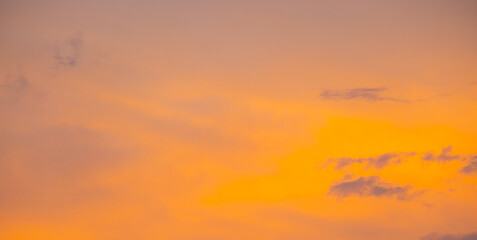 Enjoy panoramic views of the skyline . Sunset in the evening sky with colorful clouds and beautiful cloud patterns Amidst the soft golden light	
