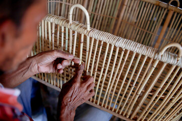 traditional market with goods made from rattan, bamboo and palm leaves.