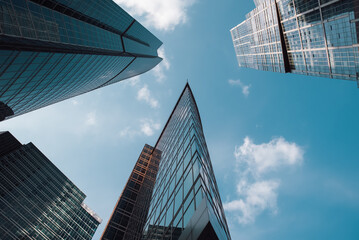 mirrored windows of the facade of an office building