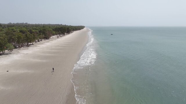 drone fly above Long white sand beach in the Bijagos Islands, West Africa.