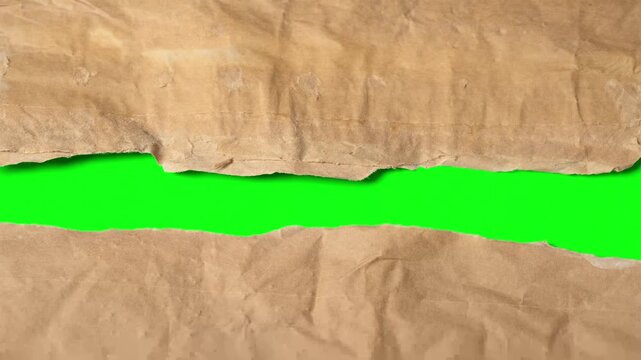 ripped textured brown paper transition on green screen, trendy footage for video editing element, 4K footage
