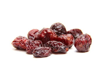 Dried cranberries arranged artistically on a white background, showcasing their rich color and texture, ideal for culinary use, health benefits, and snack options