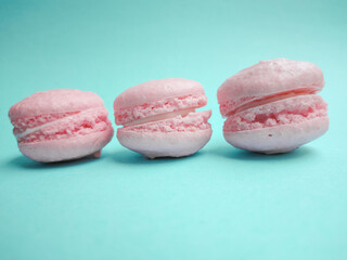 colorful macaroons on pastel background