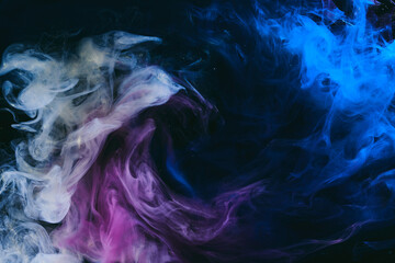 Obraz premium Abstract colorful background. Moving flow of blue purple paints, multicolored fluid liquid art