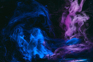 Obraz premium Abstract colorful background. Moving flow of blue purple paints, multicolored fluid liquid art
