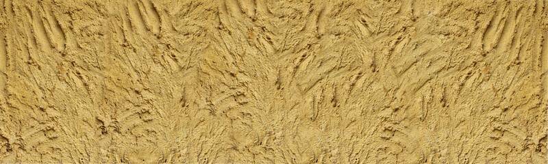 Close up of a textured golden brown wood grain pattern.  abstract pattern of natural wood grain in a warm golden. 