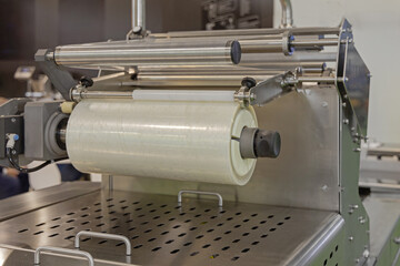 Foil Roll Food Packaging at Production Line Machine Process