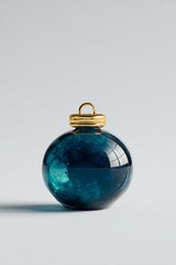 Transparent light blue glass is used to create a 3D Christmas ball ornament with a white base