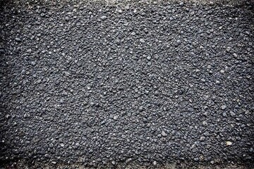 Dark, coarse asphalt texture with tiny rocks