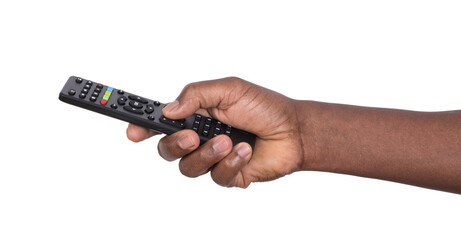 Man holding a black remote control for a television set isolated on transparent or white background	