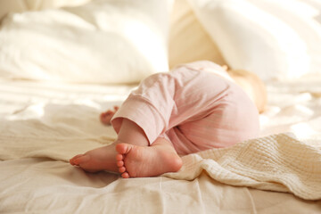 Cropped shot of cute little baby feet. Copy space, background.