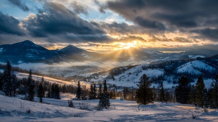Dramatic winter landscape showcases a breathtaking mountain vista illuminated by the radiant sunset, with dark, moody clouds partially obscuring the warm, golden sunlight filtering over the snowy...