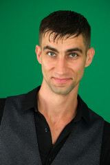 Collection of videos with fit European man in black t shirt and white pants on green chroma key background expressing various emotions smiling thinking surprised serious and confident poses.