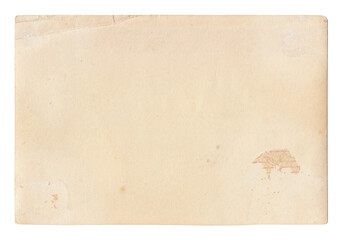 Vintage background of old ancient torn paper texture with spots. Old paper as background. Interesting texture of old yellowed paper slightly damaged by mold. Unique vintage texture of old paper.