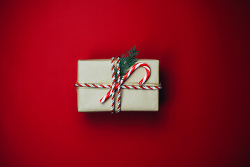 Christmas composition with gifts on a red background.