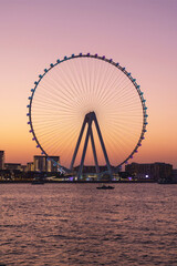 Evening sunset view over Bluewaters Island and Dubai Marina Ferris wheel, vacation, travel, scenic skyline