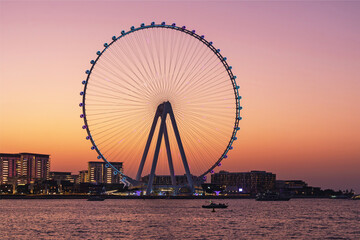 Evening sunset view over Bluewaters Island and Dubai Marina Ferris wheel, vacation, travel, scenic skyline