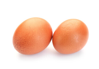 Two raw chicken eggs isolated on white