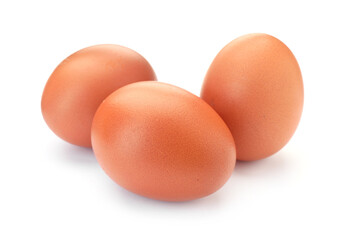 Three raw chicken eggs isolated on white