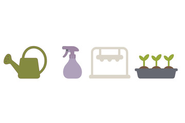 Gardening tools and supplies for indoor seed starting: watering can, spray bottle, grow light, plants