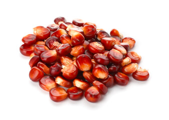 Obraz premium Pile of ripe red corn kernels isolated on white