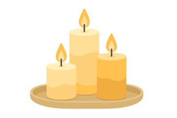 Three burning pillar candles on a round tray creating a warm atmosphere