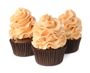 Delicious cupcakes with color cream isolated on white