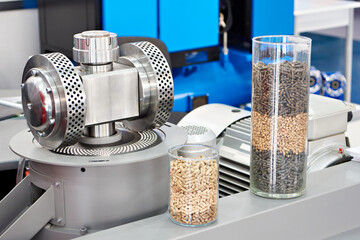 Pellet press for granulating biomass waste