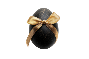 Elegant black easter egg with golden bow isolated on transparent background. Black egg with a gold ribbon isolated on white background.