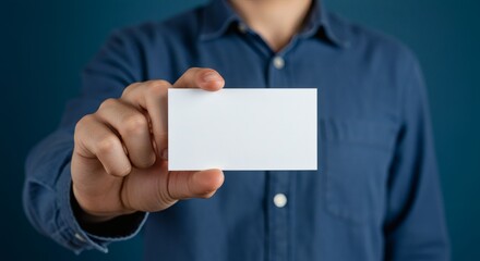 Blank Slate Man holds empty card on blue with waiting for your brand.