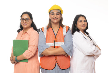 Women Empowerment in india. Indian Women standing on white background. and looking in front of the camera. Concept : Women Teacher, Engineer and Doctor. Happy Women Day
