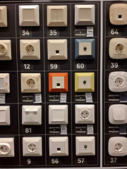 Fototapeta premium Many electric light switches in construction hypermarket