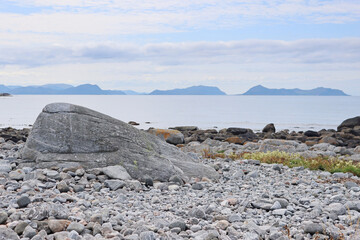 Large rock on the shore of Alnes island, Norway