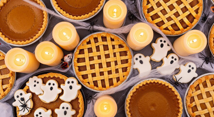 Celebrate Halloween with festive treats and spooky decor featuring ghost cookies and pumpkin pies
