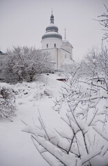 Pokrova Ukrainian Church in Nizhyn, Ukraine in winter. View of the church from behind