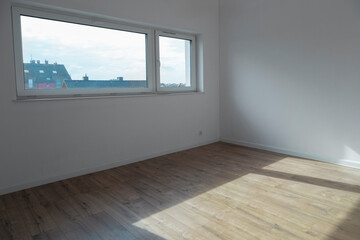 empty room with window in sunlight