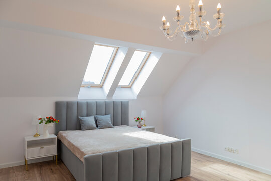 modern cozy bedroom in white modern attic