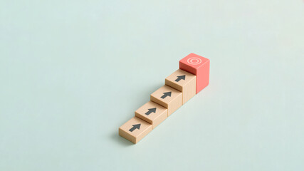 Wooden blocks forming a staircase with upward arrows symbolizing growth progress and success