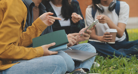 Happy students walking together on university campus, chatting and laughing outdoors after classes
