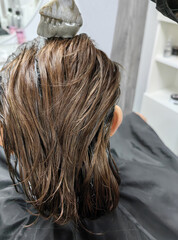 Hair treatment process in salon for smooth and healthy hair care