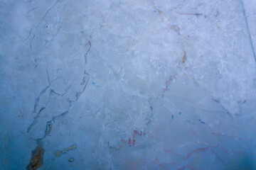 Subtle blue marble texture with delicate veining, perfect for creating elegant backgrounds and adding a touch of sophistication to design projects