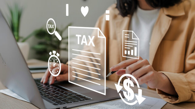 Person Using Laptop with Overlay of Tax and Financial Icons finance hands