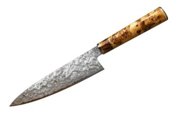 Chef knife with hammered Damascus steel blade and maple burl handle, fine taper along the spine and sharp microbevel gleam, realistic metallic detail, isolated on transparent background.
