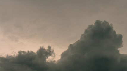 Dramatic dark storm thundercloud rain clouds on black sky background. Dark thunderstorm clouds rainny landscape. Meteorology danger windstorm disaster climate. Dark cloudscape storm disaster gray sky